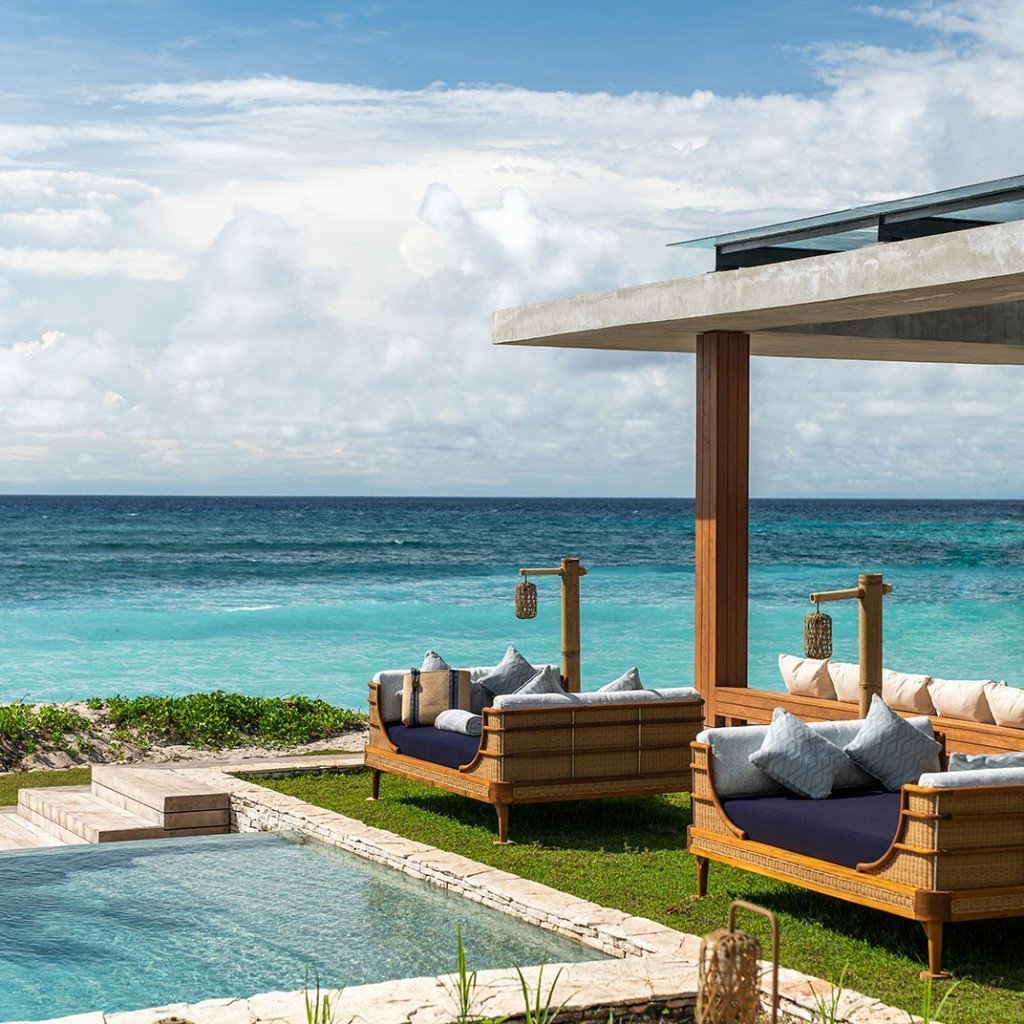 Private pool and daybeds above the ocean at Cap Karoso
