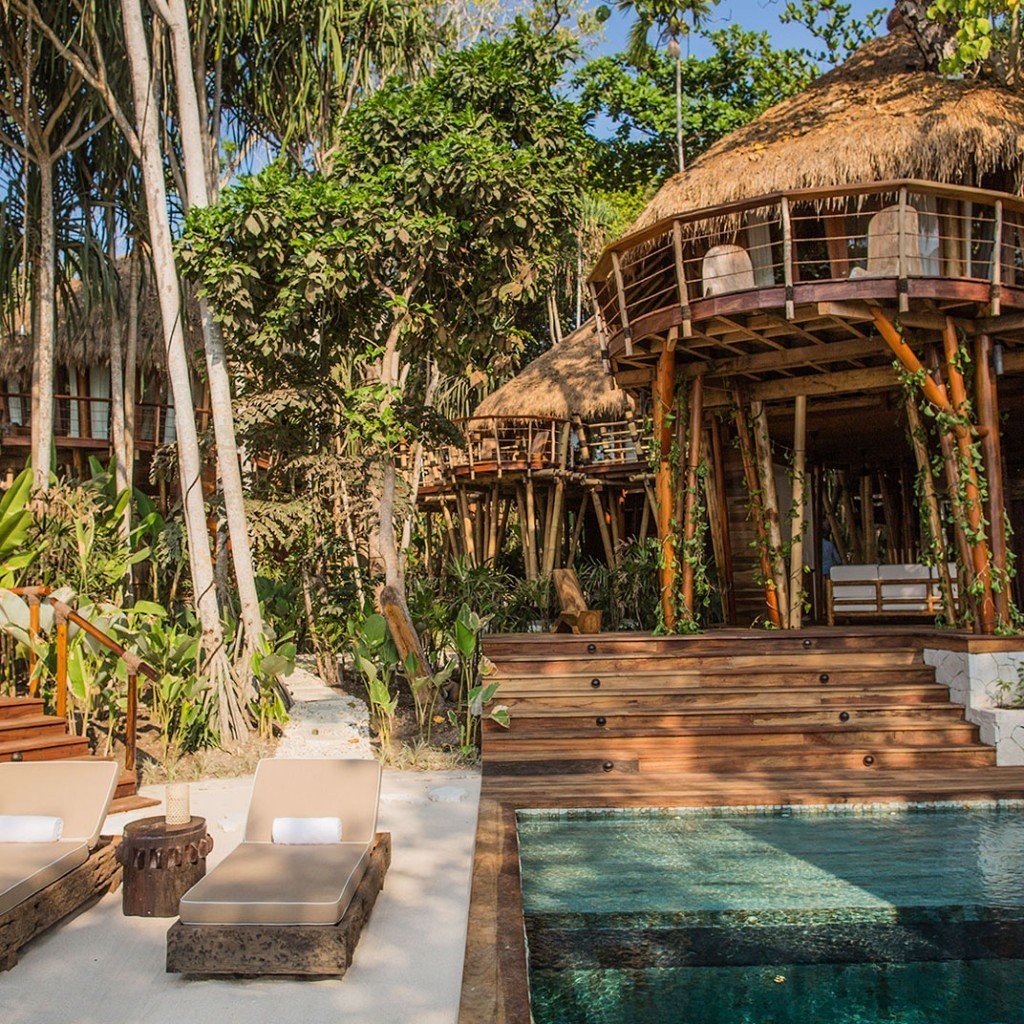 Treehouse villa above its pool at Nihi Sumba