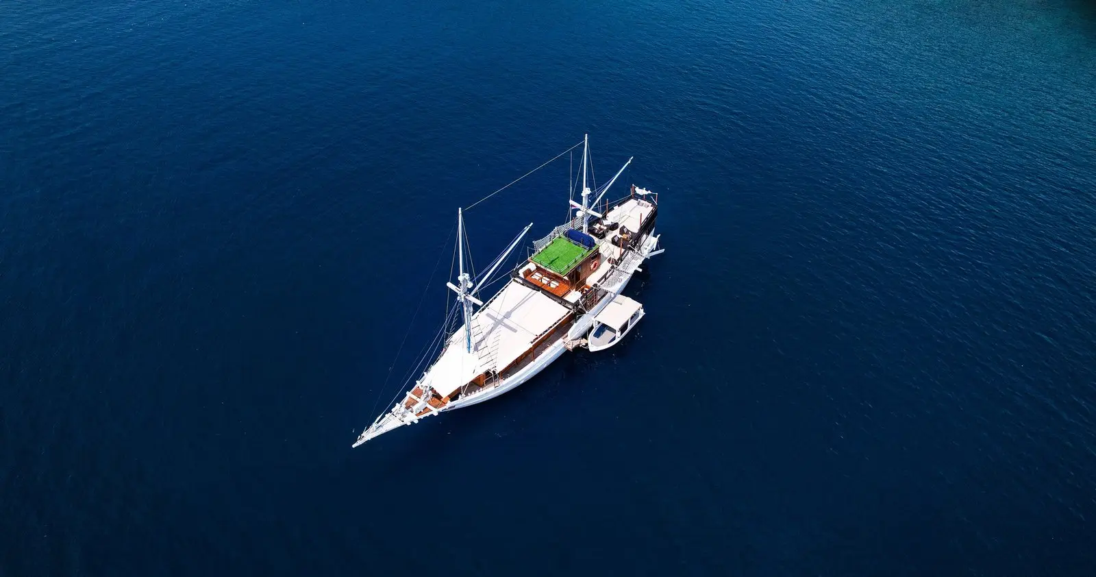 Aerial view of Ikan Kayu, a 6-cabin yacht chartering in Komodo and Sumbawa, Indonesia