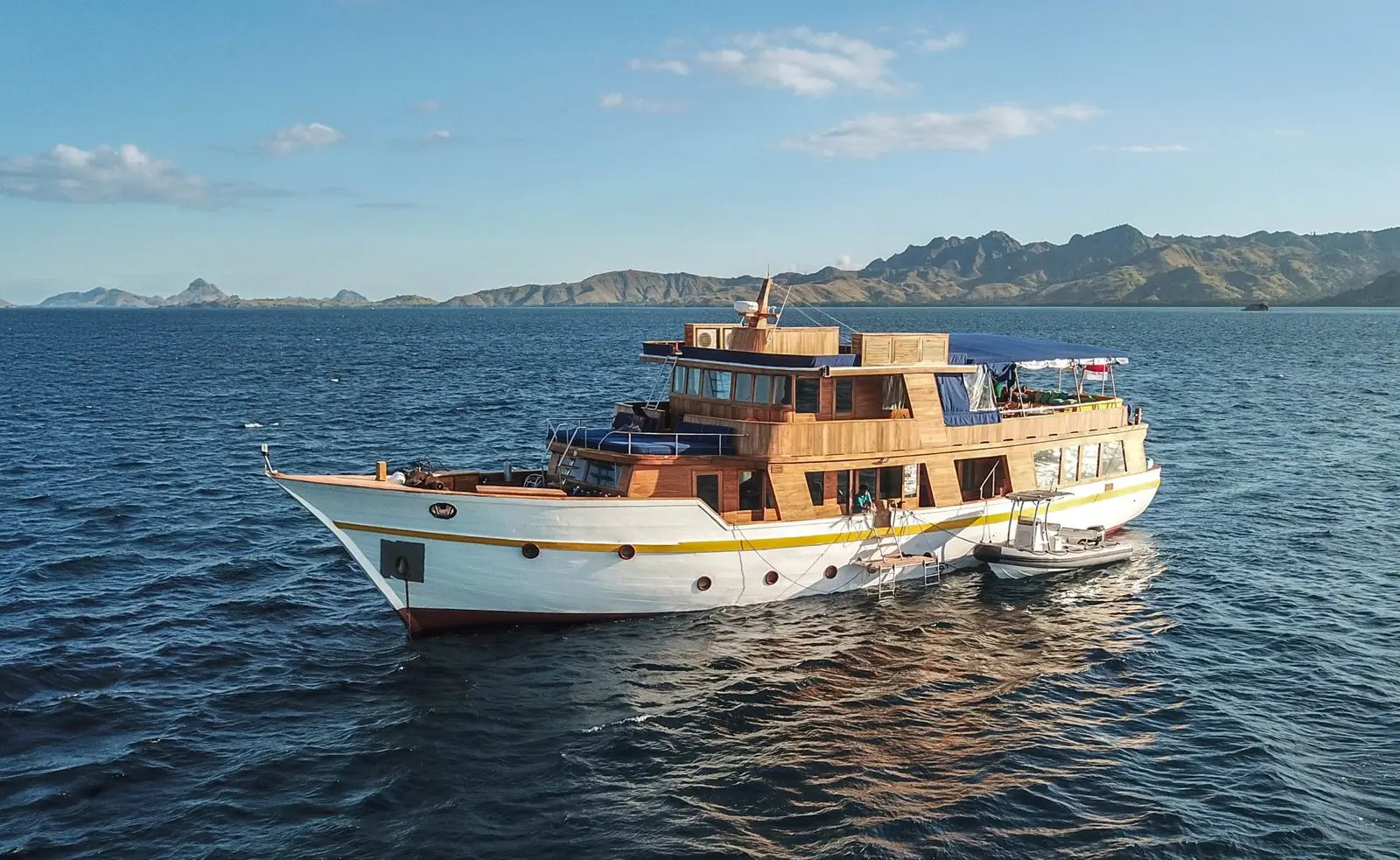 Magia II, a 4-cabin teak motor cruiser for private charter in Komodo, Raja Ampat and the Banda Sea