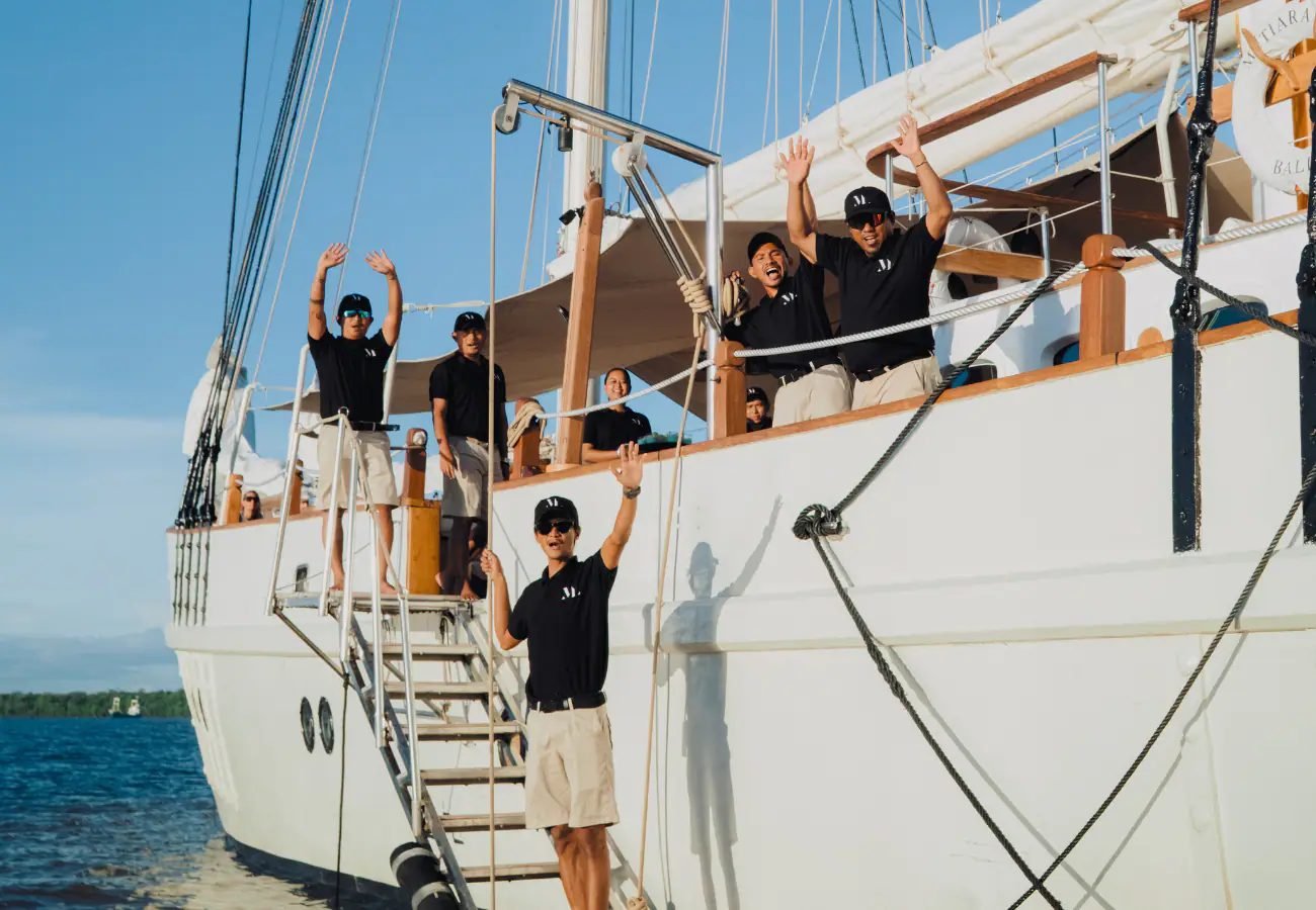 Guests on deck aboard Mutiara Laut