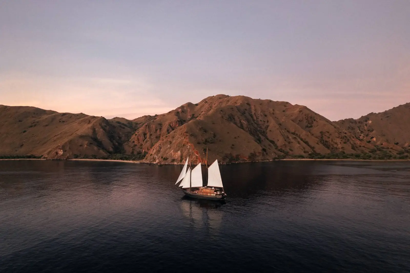 Vela, a 6-cabin phinisi for private charter in Komodo, Raja Ampat, Alor and the Spice Islands